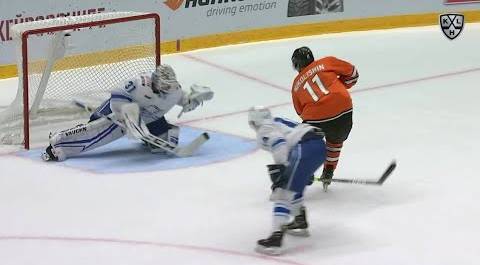 Ortio saves it with his goalie stick